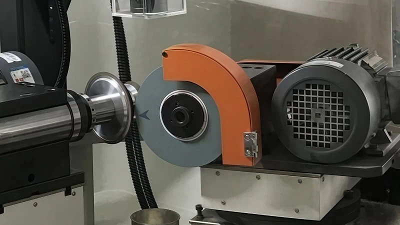 Diamond dressing process showing truing and dressing operations on a grinding wheel